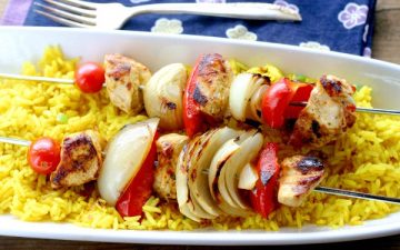 Finished smoked Paprika and Thai Chili Chicken Kebobs with Turmeric Rice