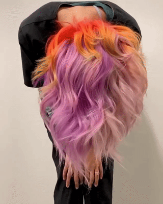 Holographic Hair Tutorial - How To Get That Stunning Holo Hair 1 woman shaking her holographic hair in slow motion gif
