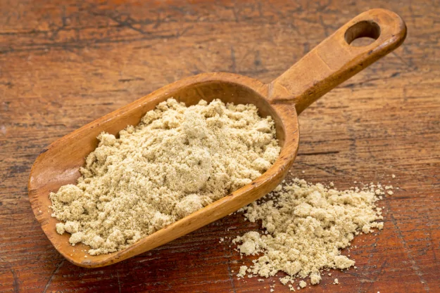 High quality rice bran in a wooden spoon