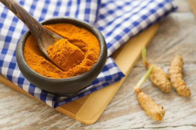 Image of a jar of turmeric ready to used for a diy face mask without honey