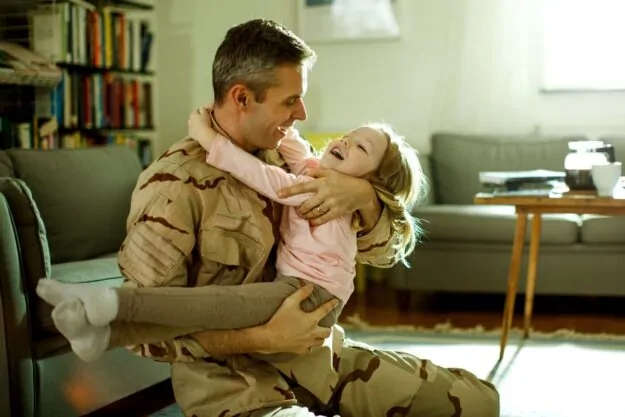 Military dad returns home to find daughter sleeping in a locked kitchen