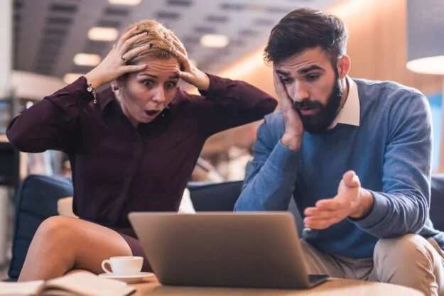 employees looking at their laptop