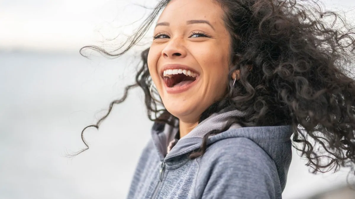 Laughing woman 1200x675 1