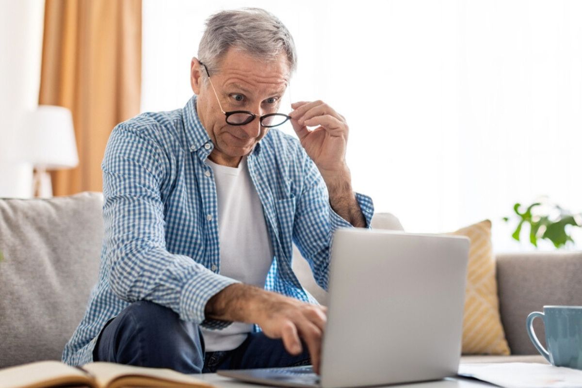 Boomer looking at laptop