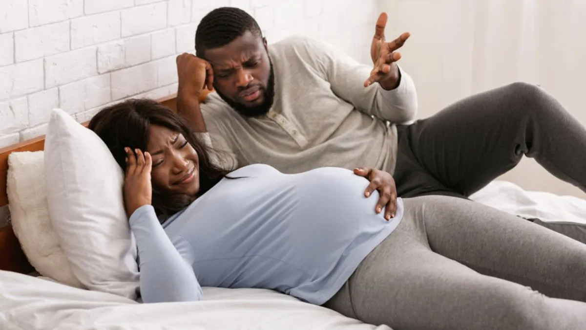 Pregnant couple angry 675x1200 1
